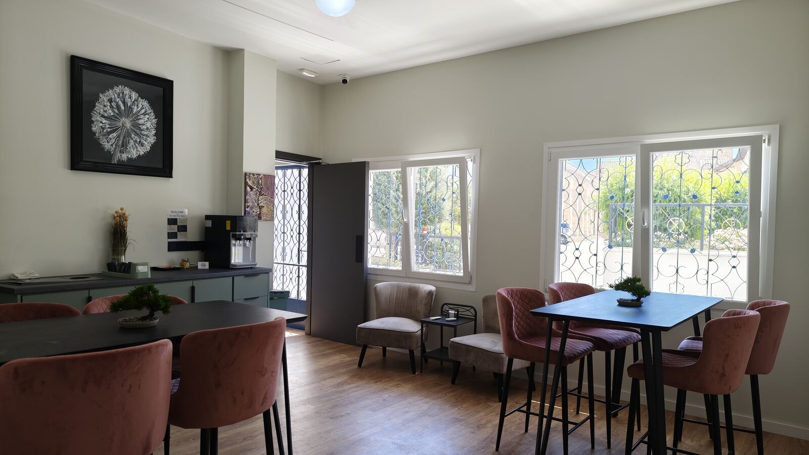 Shared guest lounge common area with welcome station