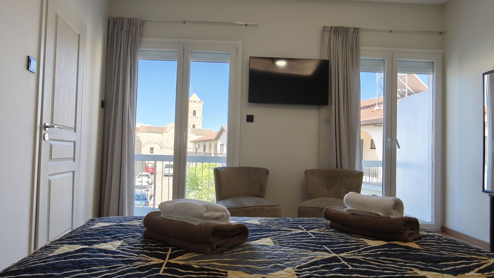 Room H4 balcony view of Agios Lazaros church tower, St. Lazarus City Hotel