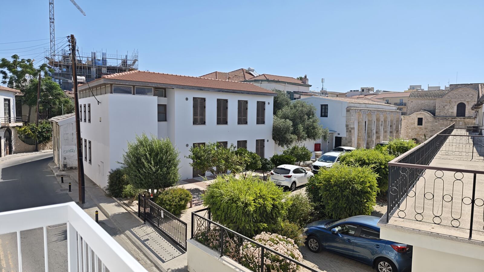 View from Room H6 balcony over old town rooftops, St. Lazarus City Hotel