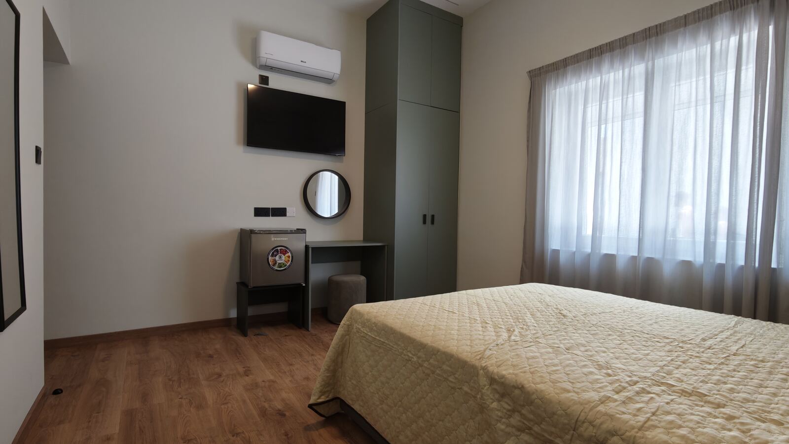 Standard double room with sage wardrobe, another instance of the shared design, St. Lazarus City Hotel