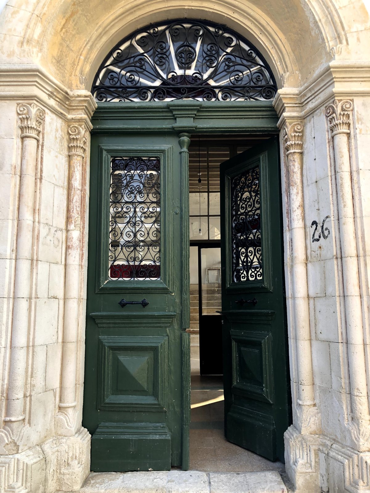 The green entrance door at Hadji Ibrahim 26