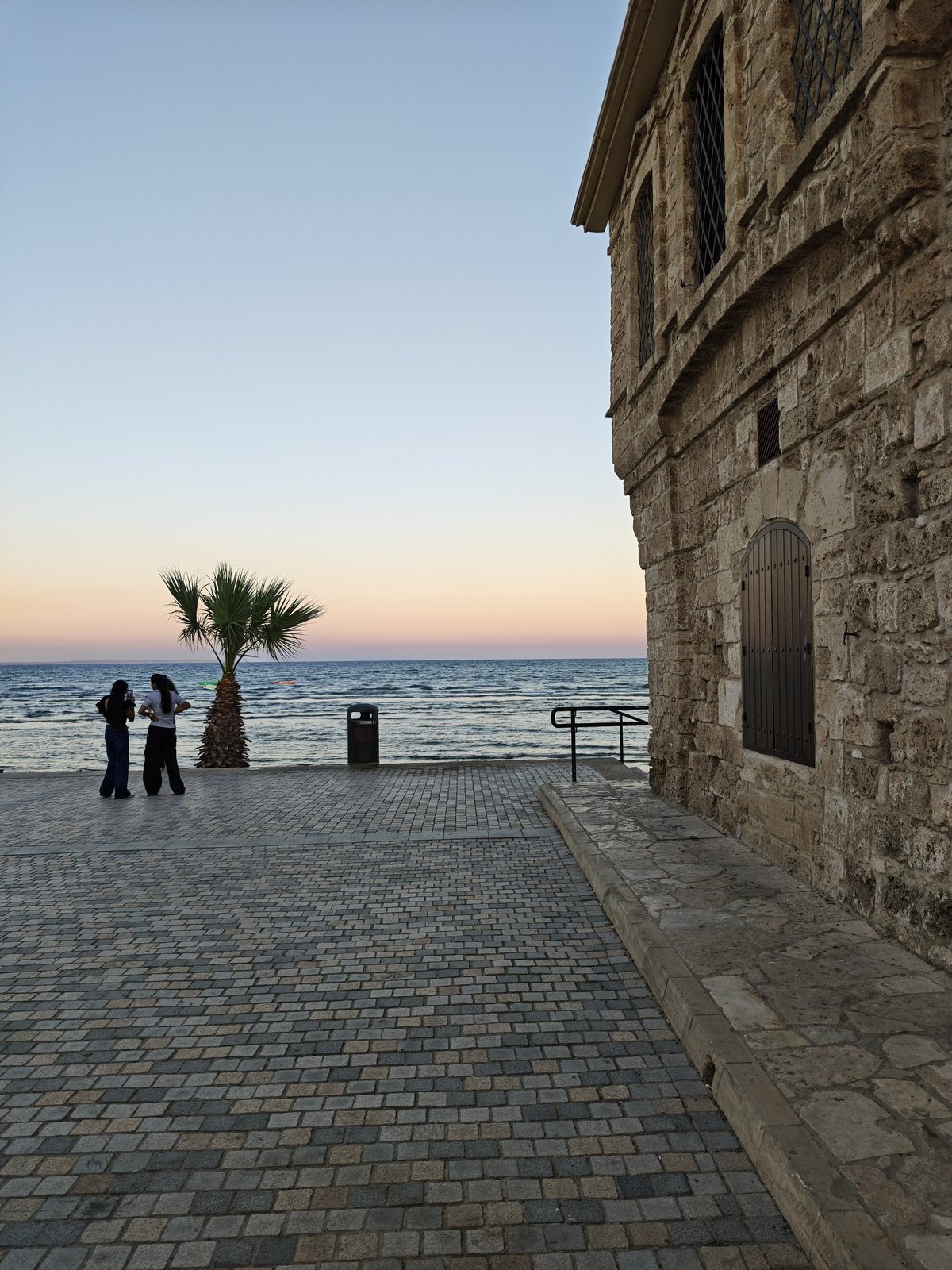 The old-town seafront near Le Mat Hostel at sunset